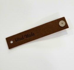 Кожаная бирка с кнопкой "НМ" 8 × 1,5 см цвет коричневый